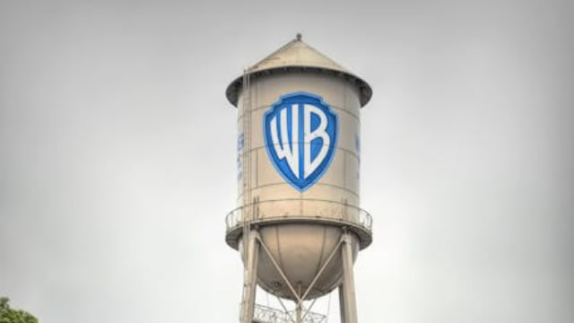 Warner Bros' credit rating downgraded to junk by Fitch on split-up