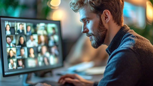 Zoom Analysts Boost Targets, Raise Hands As AI Tools Gain Traction