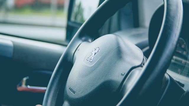 Stellantis reports first annual loss since 2021 as it retreats from EV targets