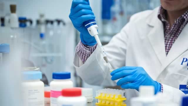 Pfizer Crosses Below Key Moving Average Level