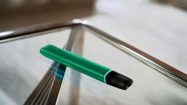 Philip Morris cuts annual profit forecast