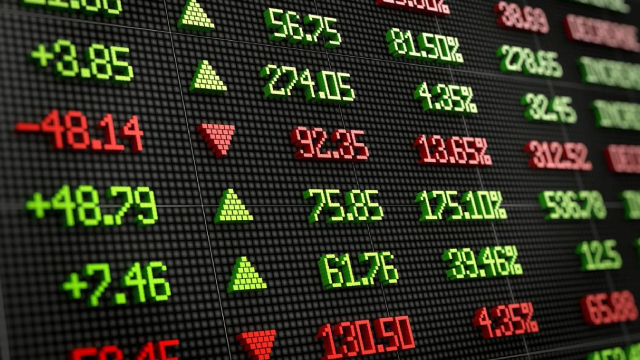 Gold Gains 1%; Wingstop Shares Spike Higher
