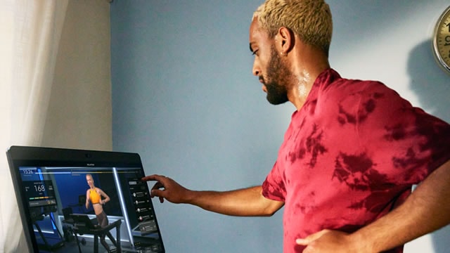 Peloton's improving profitability offsets questions around subscriber growth, UBS says